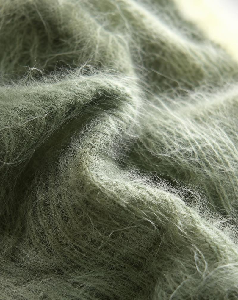 Close-up of brushed sage mohair fibres